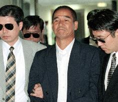 Tanaka extradited to Japan from Thailand